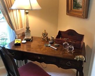 Henredon writing desk with three drawers and side chair, Glass Apple paperweights and desk accessories