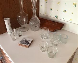 Crystal decanters, coasters, votive glasses and shot glasses
