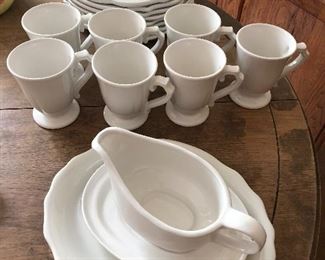 White porcelain plates and coffee cups