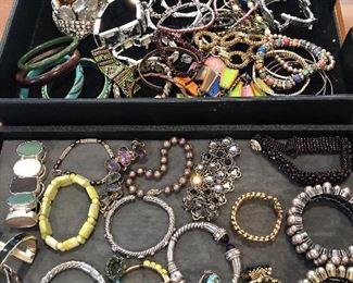Large selection of costume jewelry some sterling silver… Bracelets, necklaces, earrings both clip and pierced, rings.