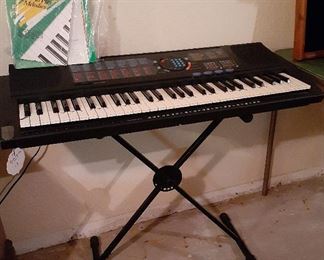 Yamaha keyboard and stand