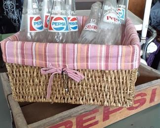 Vintage Pepsi bottles and crate