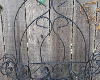 Wall-mounted plant basket