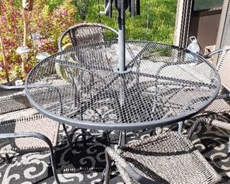 Patio table and umbrella pole