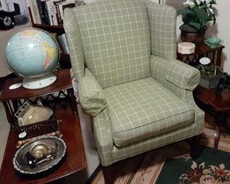 Wingback chair and vintage two-tier side tables 