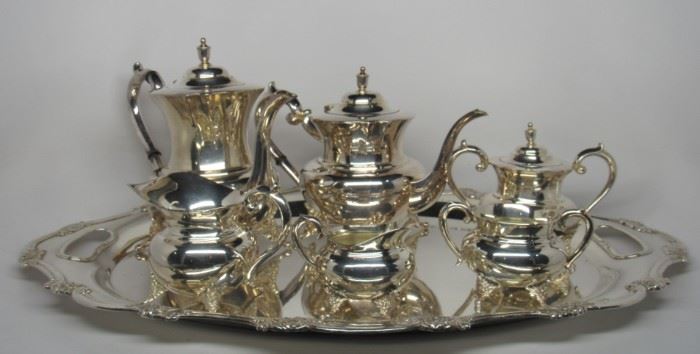 Located in: Chattanooga, TN
MFG Gorham Silver Company
Sterling Silver Coffee & Tea Service Set
6 Piece
Est. Appraisal Value - $10,900.00 * See Web Link*
Includes: 8" Coffee Pot, 8" Teapot, 6" Covered Sugar, 5" Creamer, 3" Creamer, 3" Double Handled Open Sugar, & 25" Handle to Handle Waiter
Total Sterling Silver Weight - 5.2 lbs
*Tray is Nickel Silver* *See Web Link*
*Serving Set is Sterling Silver* * See Web Link*
*Sold As Is Where Is*