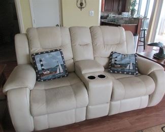 Reclining Love Seat (needs to be cleaned) but works fine and is comfortable