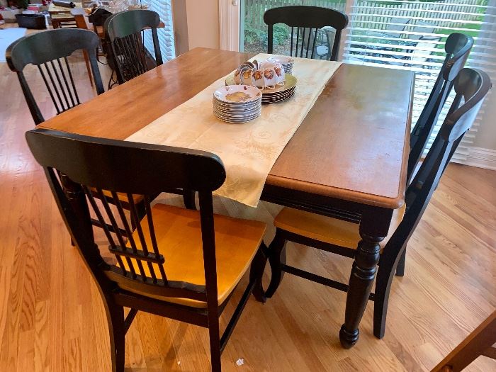 This is a terrific kitchen table set with six chairs - the table is square, the leaf can be removed to be a narrow table should your kitchen be less roomy.
