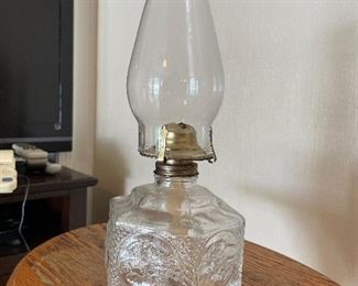 #3	misc	Clear glass horse and buggy oil lamp 14"	 $ 20.00 