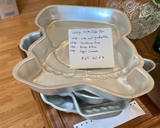 #56		Vintage Wilton Cake Pan: 1978 wise owl graduation, 1972 christmas tree, 1983 baby stork, 1978 ziggy cartoon	 $ 25.00 