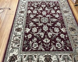 #66		Maroon/Tan Floral Machine Made Rug - 62x93	 $ 50.00 