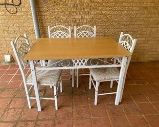 #87		Rectangular Metal Table with Laminate top and 4 metal decorative chairs - 46x30x31	 $ 75.00 