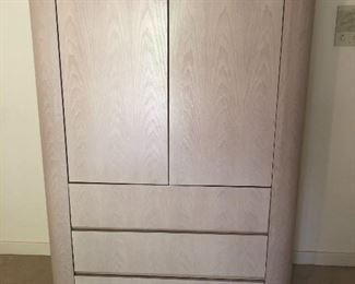 TV Armoire with pull-out, swivel stand and 3 easy glide drawers. Solid wood. Custom Made. Sleek curved design. 