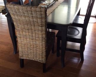 Farm House dining table with wicker accent chairs