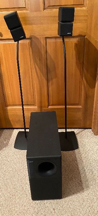 Bose Accoustimass 5 Series II Reflecting System With the two small speakers measuring 6.5 tall x 3 wide and the subwoofer measuring 14 tall x 7.5 wide x 19 deep. The small speakers have metal stands.
