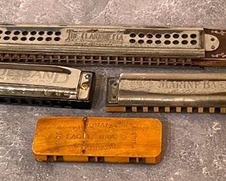Four Vintage Harmonicas 

The Clarionetta
Hohner Blues Band
Hohner Marine Band
Chromatic Eagle Brand