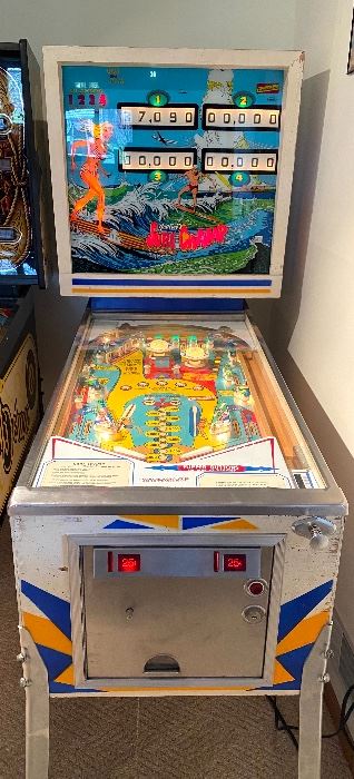 D. Gottlieb Co Surf Champ Pinball Machine with manual and key. Manufactured in 1976.

Fun bright colored graphics, great sound and hours of entertainment! 
