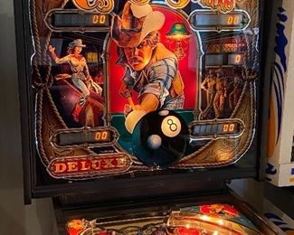Bally Eight Ball Deluxe Pinball Machine. Works great and comes with the key and manual.

Eight Ball Deluxe is a pinball machine designed by George Christian and released by Bally in 1981. The game features a cue sports theme and was so popular that it was produced again in 1984.