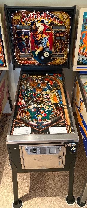 Bally Eight Ball Deluxe Pinball Machine. Works great and comes with the key and manual.

Eight Ball Deluxe is a pinball machine designed by George Christian and released by Bally in 1981. The game features a cue sports theme and was so popular that it was produced again in 1984.