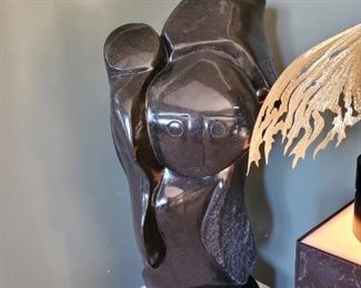 "Lovers protected by Ancestor Spirit" by Henry Munyaradzi. 46" tall including pedastal. Medium: Springstone Serpentine