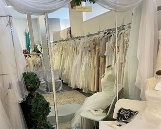 Entire inventory of bridal gowns, accessories, veils, tiaras must go. 
Even the Mirrors and body forms. Cash only please. 