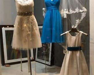 Informal wedding dresses.
Destination Bridals. 
Attendant’s dresses. 
Mothers dresses. 
Flower girls. All just $10 each, cash only please.
There are no try-on‘s and all sales are final with no returns or exchanges. 
Dress forms for sale, artwork for sale, window props for sale, Veils for sale. 