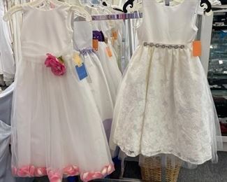 Flower girl dresses. Bridal gowns. 
No try ons at $10 ea
Tell your friends!