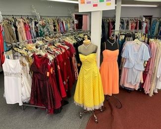 Literally thousands of dresses, and formals. 
Cocktail dresses, summer Party dresses, Mothers dresses, Christmas dresses, Dinner dresses,  all just $10 each, cash only. 
At this ridiculous price, there is no tryon and  all sales are final. 