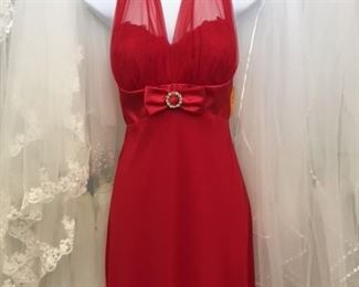 Glamorous simple chiffon. Price, $10.
Wedding veils, two for $10, dress forms for sale. 