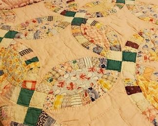 Several BEAUTIFUL handsewn vintage quilts