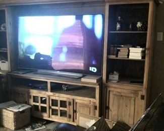 Large rustic entertainment center and Flat Screen
