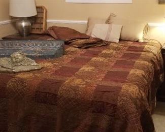 Bed spread with several pillows
