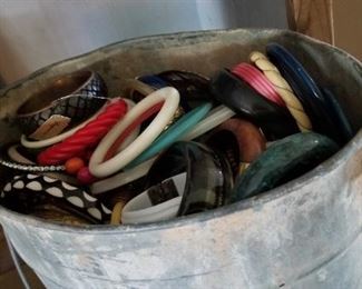 A bucket of bracelets, vintage and modern