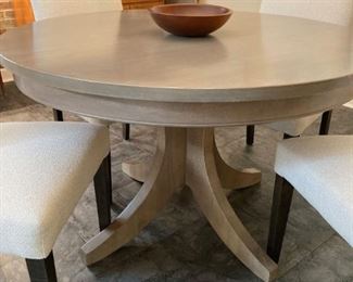 Basset round table, grey color, plus one leaf