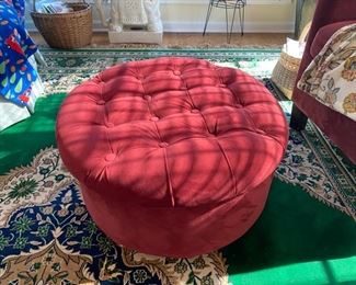 Storage space red ottoman