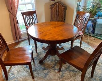 Dining table with 1 leaf and 4 chairs