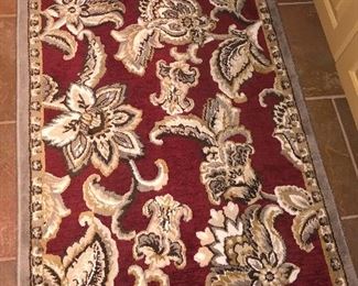 One of 2 area rugs