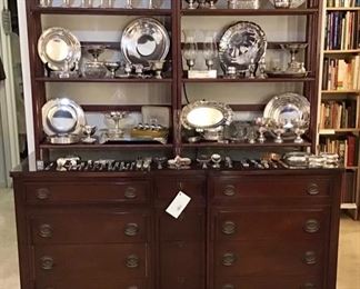 Antique Chippendale chest. 12 dovetailed drawers. Mahogany with shaped glass to protect top.  Sterling silver Goblets, bowls, compotes, Trays, flatware, plates, pictures, snifters, etc.