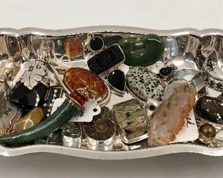 Jade, amber, fossil, sterling, abalone, enhancers. 