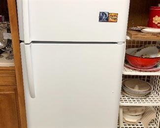 Frigidaire 18 ft.³ top freezer refrigerator. Pick up after May 30. 
Clean, clean, clean! 