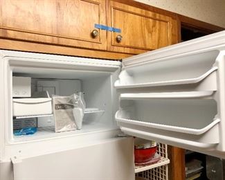 Frigidaire 18 ft.³ top freezer refrigerator. Pick up after May 30. 
Clean, clean, clean! 