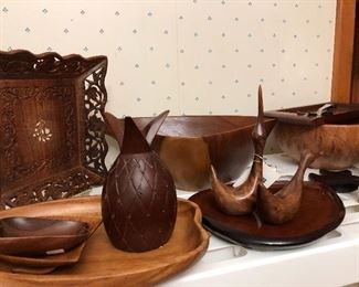 Mid Century carved wood serving pieces and decor. 
