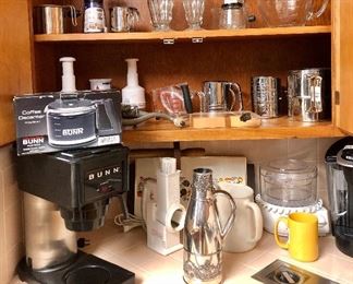 New Bunn coffee pot, never used. Lots of kitchen goodies.