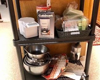 Kitchen goodies including Cuisinart Mini Chopper and Krups Touch Top coffee mill, never used, both still in boxes. 