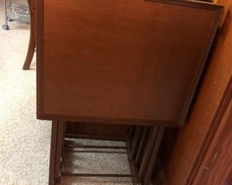 Set of four mid century TV trays and stand.
