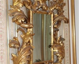 Italian Carved Giltwood Mirror with scrolling leaf tips