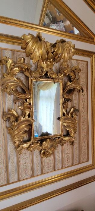 Italian Carved Giltwood Mirror with scrolling leaf tips