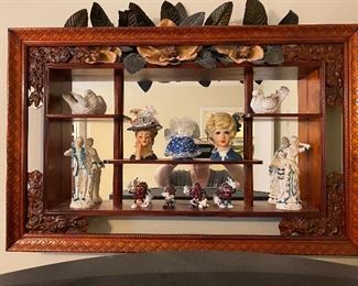 Framed mirror with collectibles