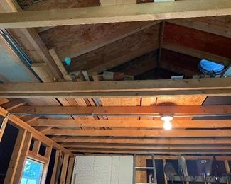 Lumber - Inside storage shed  in rafters