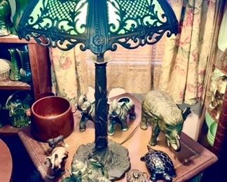 Antique lamp w/ plastic inserts (original glass is not present), elephant collection, turtle figure, etc.